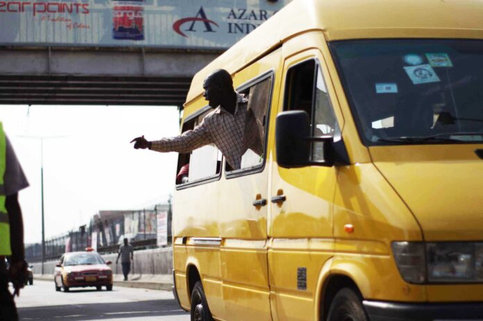 Ghanaian_Trotro_mate_005-scaled